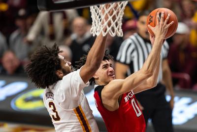 Derry S Baker Scores 13 But Rutgers Falls To Minnesota College