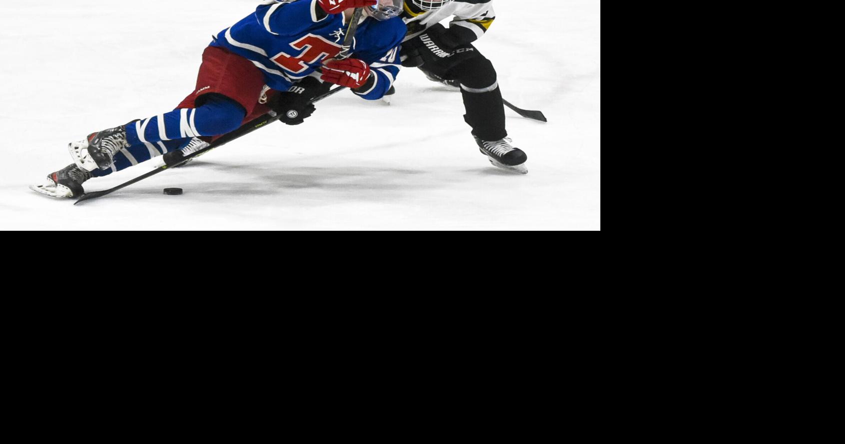 High schools Trinity hockey team tops Manchester, 41 Sports