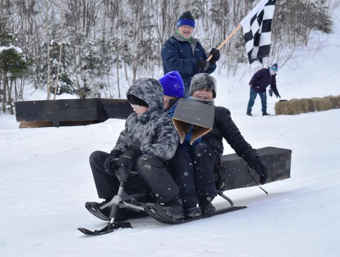 Sledding trio