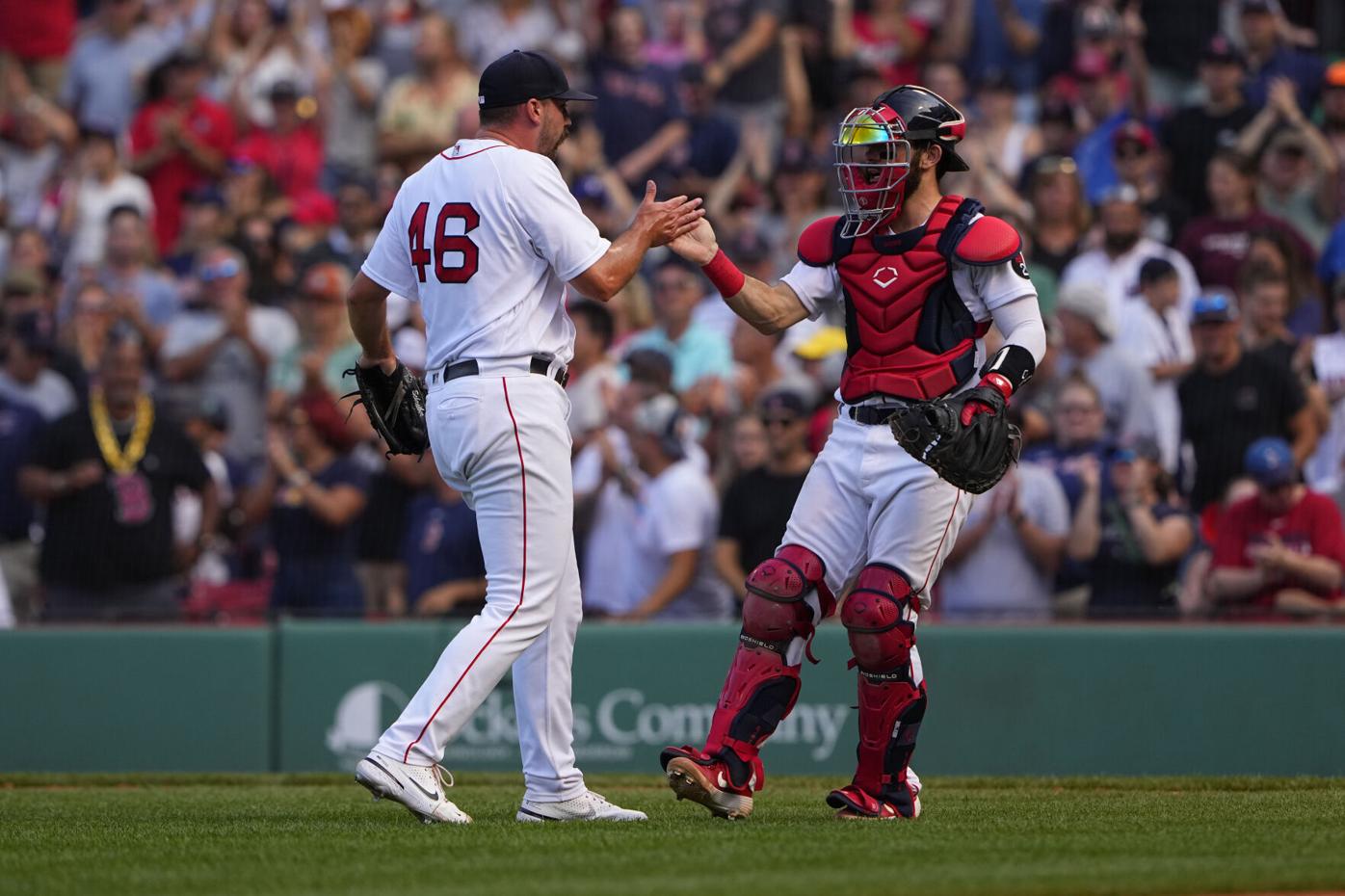 Trevor Story of the Boston Red Sox reacts after hitting an RBI