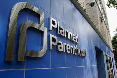 FILE PHOTO: A sign is pictured at the entrance to a Planned Parenthood building in New York