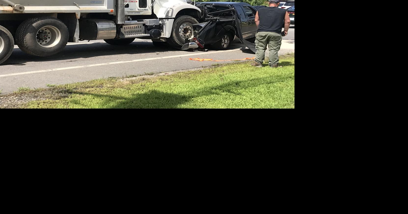 Dump truck driver charged in Salem school bus accident that injured 20