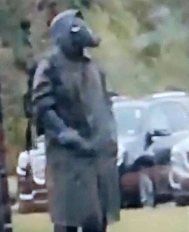 gas mask and trench coat