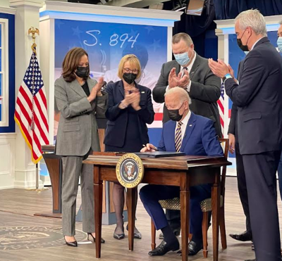 Biden signs Hassan bill to recruit vets to health care careers