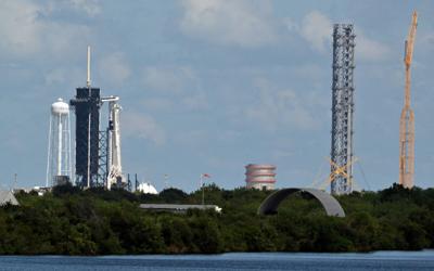 FILE PHOTO: A SpaceX Falcon 9 rocket with the Crew Dragon capsule stands on Pad-39A in preparation for a mission to carry four crew members to the International Space Station