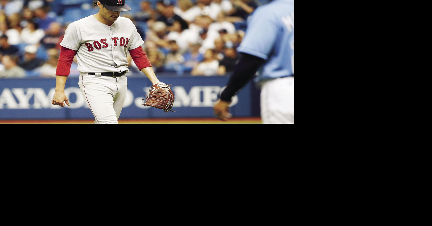 Boston Red Sox relief pitcher Matt Barnes walks to the dugout