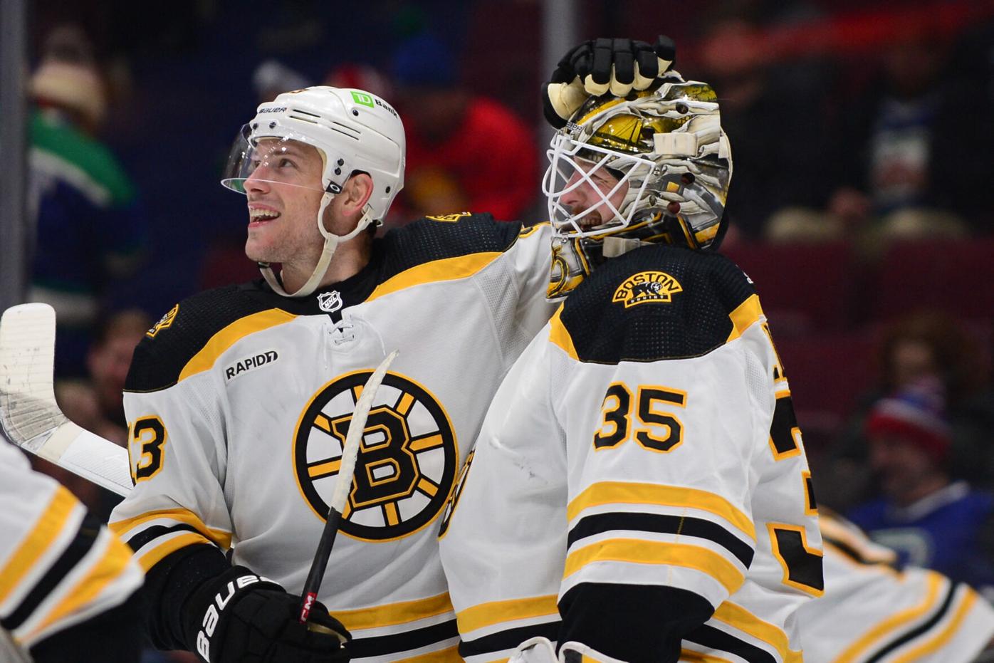 Bruins Goalies Hug It Out Puck, EXCLUSIVE