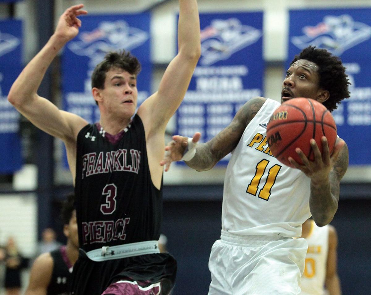 Snhu Men S Basketball Team Squeezes Franklin Pierce College