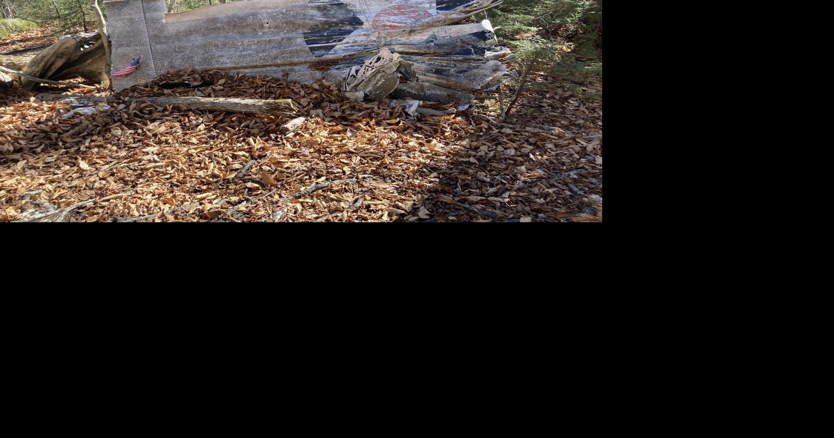 NH Outside A mountain memorial for World War II crash site NH