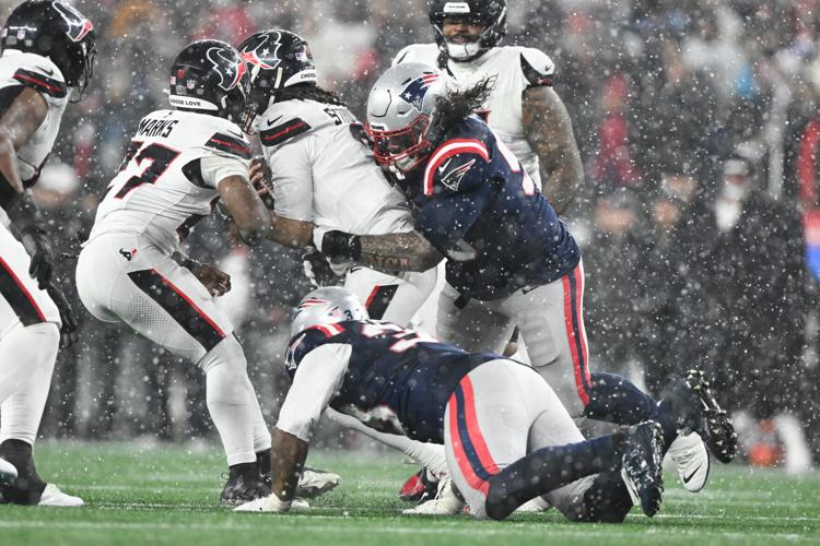 Patriots defense dominates C.J. Stroud's Texans in snowy playoff ...