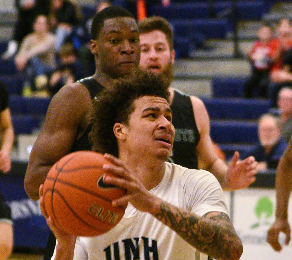 Men S College Basketball Unh Pulls Away Down The Stretch Tops