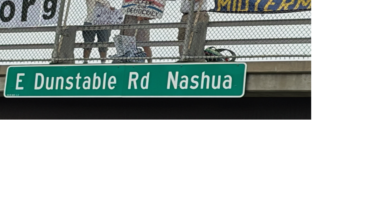 Police ticket two ‘Bridge Brigade' leaders for violating sign law