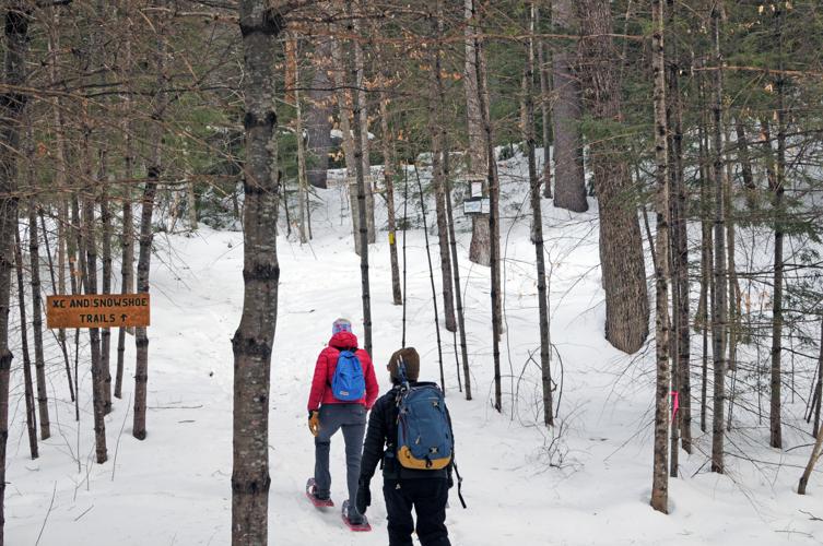 NH Winter Snowshoe trails at Purity Spring Resort include lake