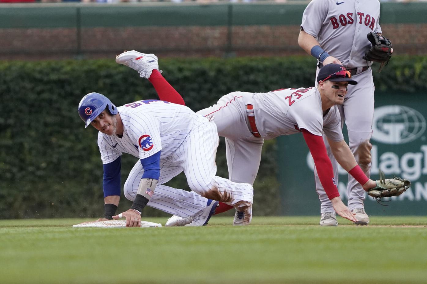 Bellinger hits a grand slam as Cubs cool off Red Sox 10-4