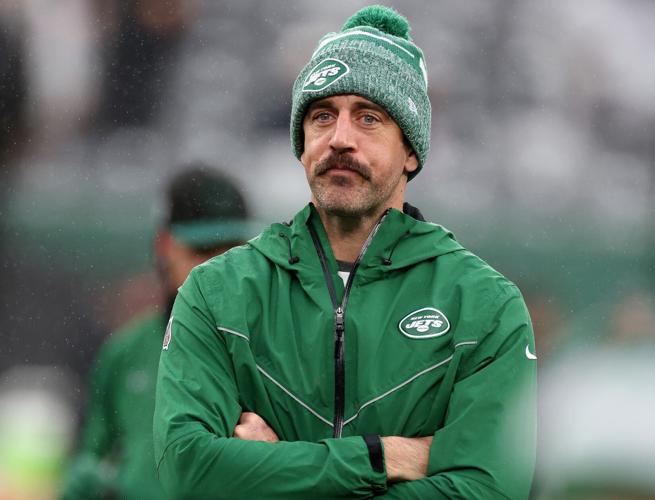 EAST RUTHERFORD, NEW JERSEY - DECEMBER 03: Aaron Rodgers #8 of the New York Jets looks on during warm ups prior to the game against the Atlanta Falcons at MetLife Stadium on December 03, 2023 in East Rutherford, New Jersey. (Photo by Al Bello/Getty Images)