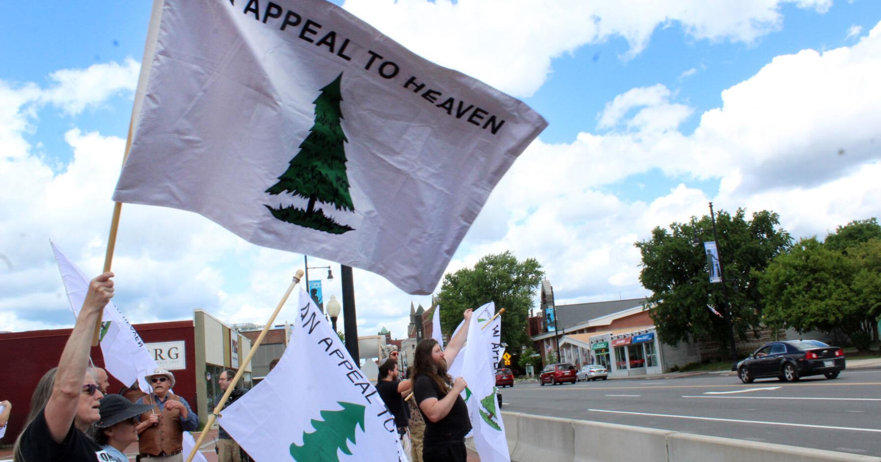 Libertarians stage City Hall protest of mayor's decision against flying 'Pine Tree Flag' - Vimarsana News