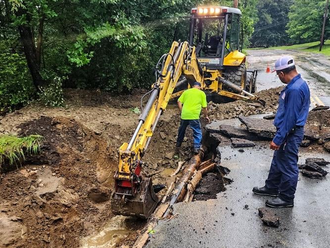 Storms wash out roads around region; Swanzey camp evacuated Weather