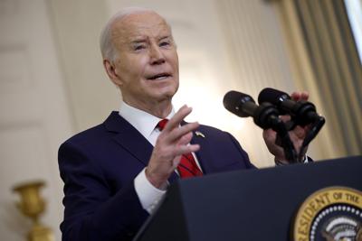 WASHINGTON, DC - APRIL 24: U.S. President Joe Biden delivers remarks after signing legislation giving $95 billion in aid to Ukraine, Israel and Taiwan in the State Dining Room at the White House on April 24, 2024 in Washington, DC. The legislation was m...
