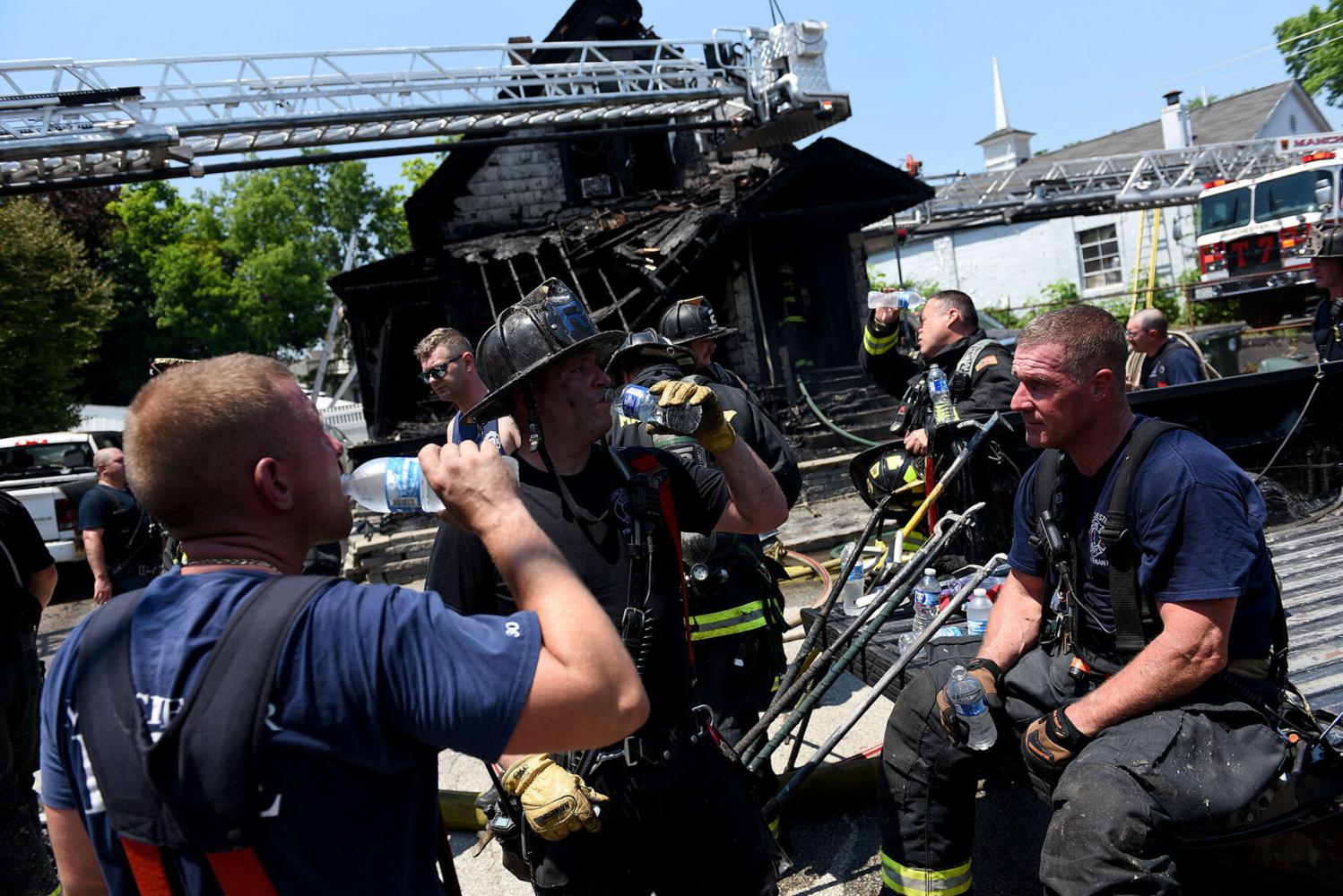 Manchester firefighters battle blaze on hottest day of the year | Local ...