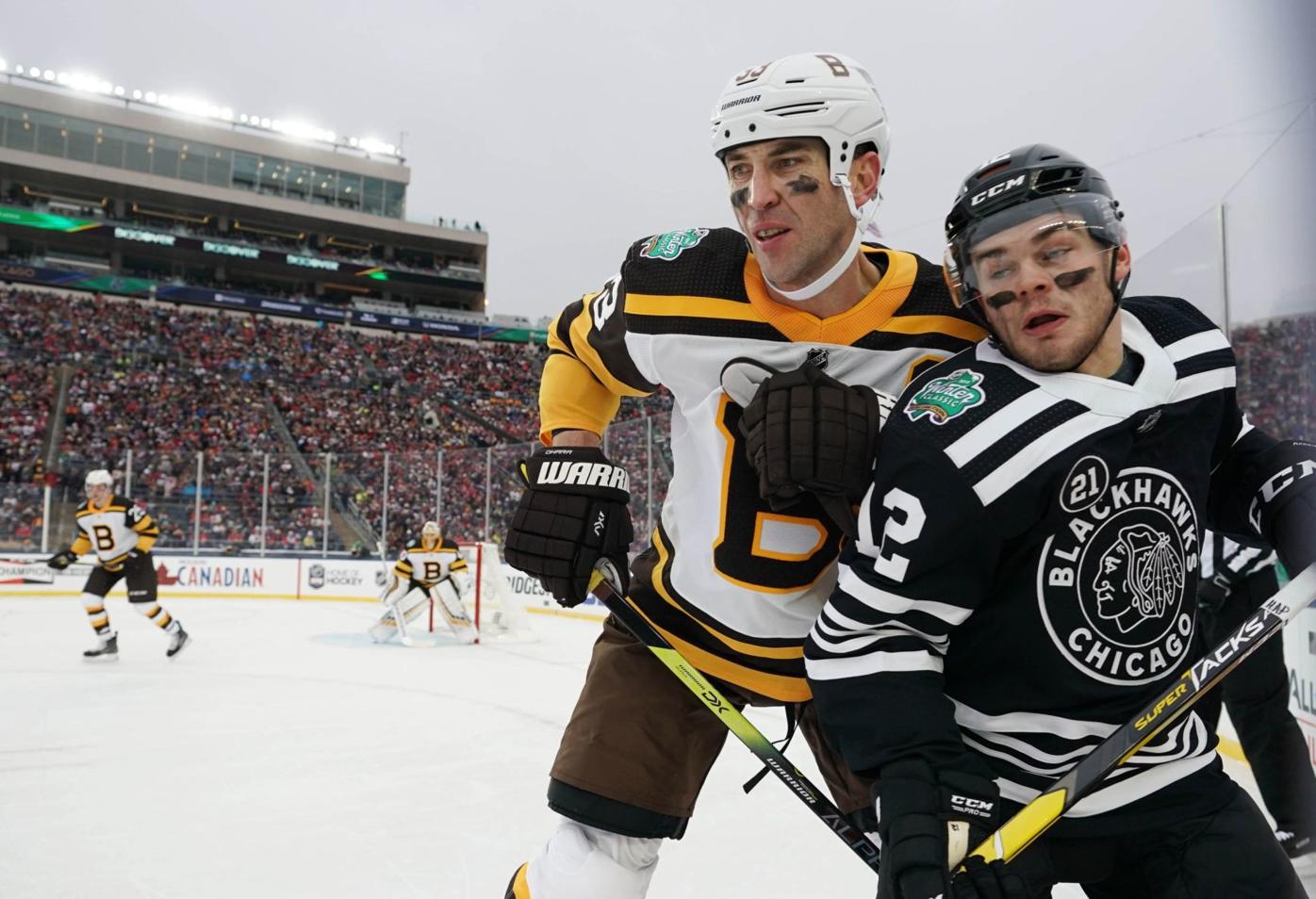Pastrnak, Bruins beat Blackhawks 4-2 in Winter Classic