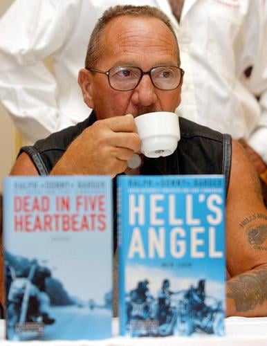 FILE PHOTO: HELL'S ANGEL LEGEND SONNY BARGER DRINKS COFFEE DURING A NEWS CONFERENCEIN VIENNA.
