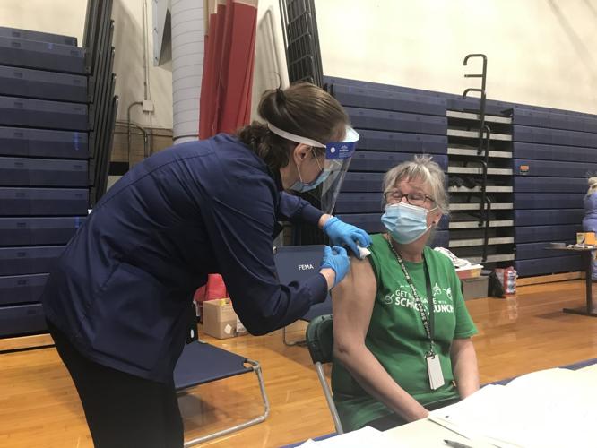 Vaccines for those over 50 start with glitches