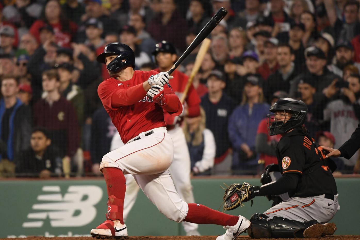 Adam Duvall of the Boston Red Sox hits a three-run home run during