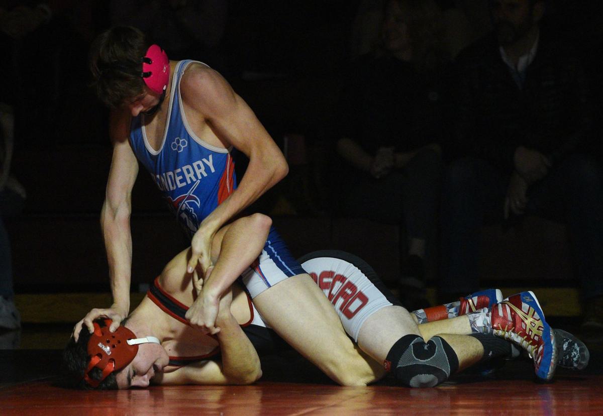 Bedford Wrestling Captain Sidelined But Still Contributing High