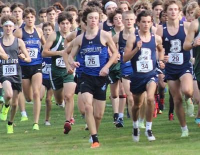 Cole McCue runs with pack