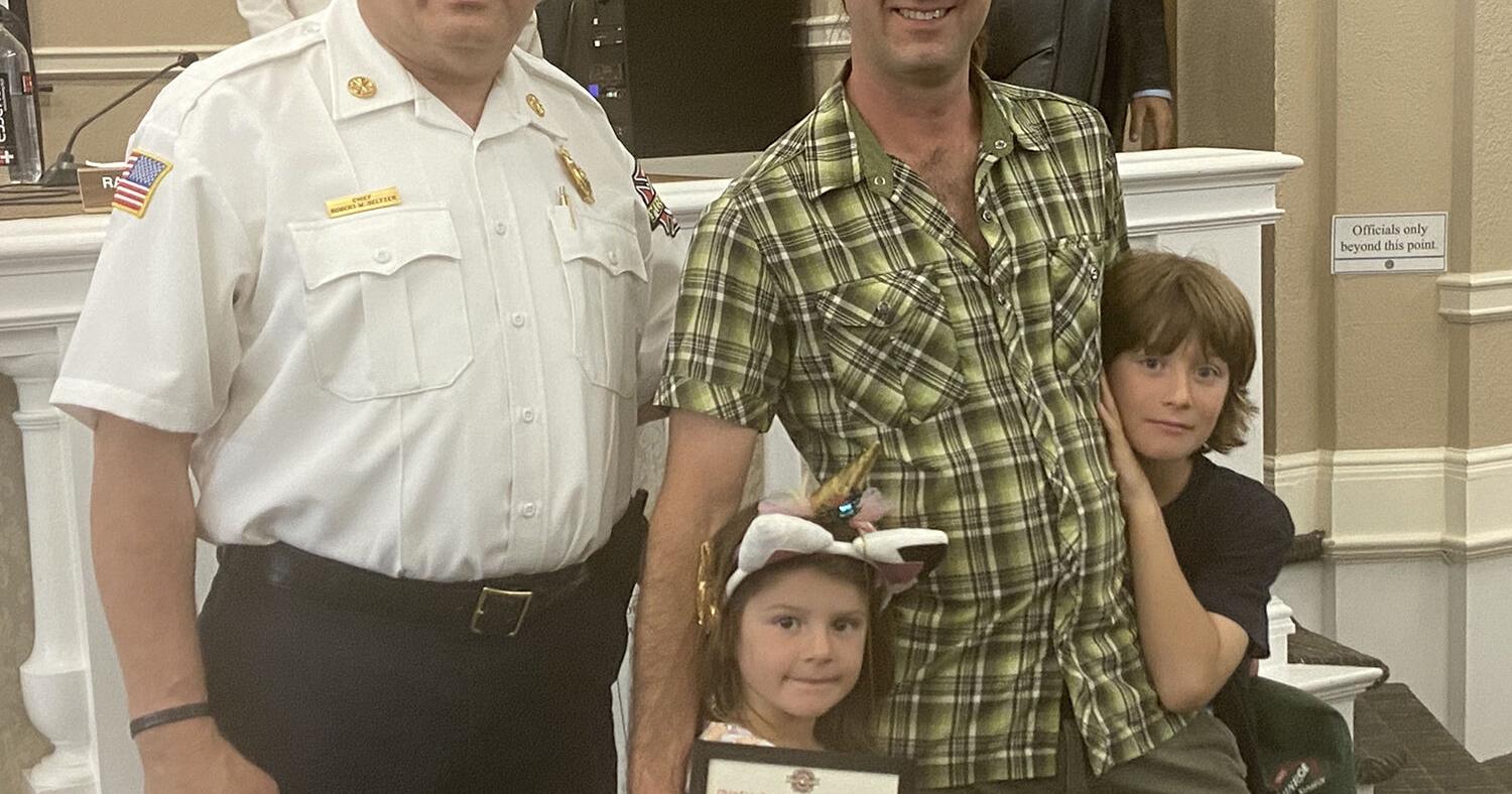 Smithfield fire chief recognizes hero milkman for saving dog - Vimarsana News