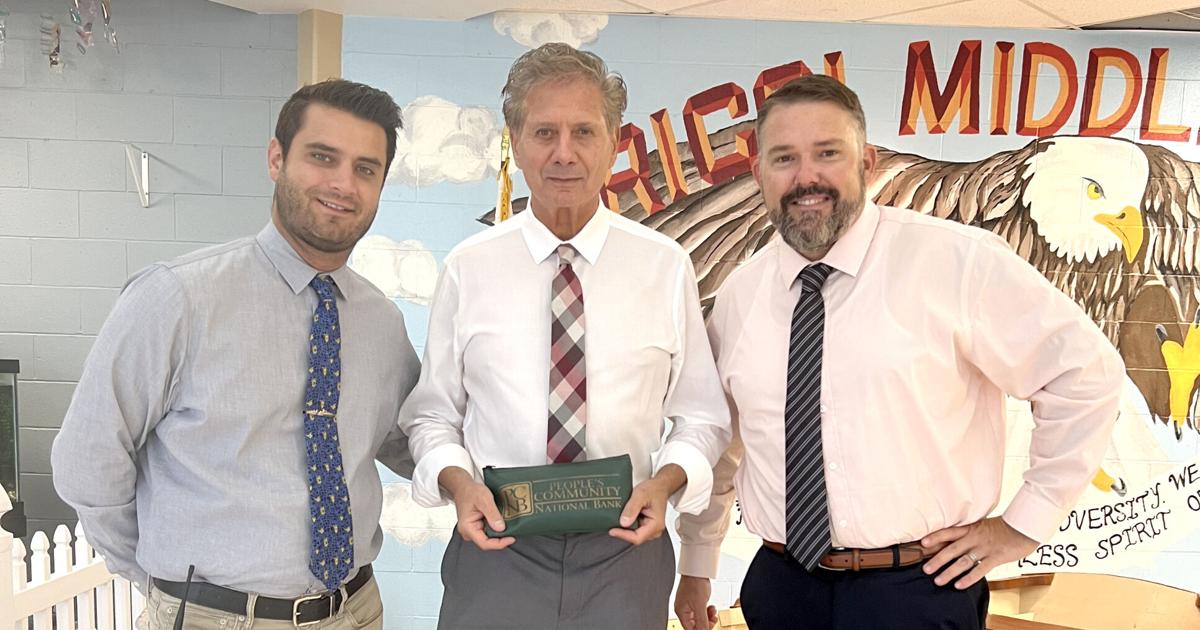 Ricci Middle School receives donation from Realty Center North