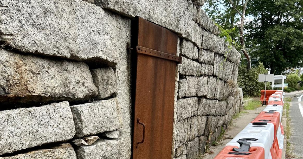 Cemetery wall repairs back in state's hands