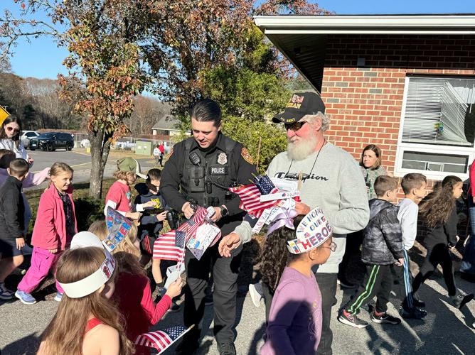 Students honor veterans with first Hometown Heroes event | News ...