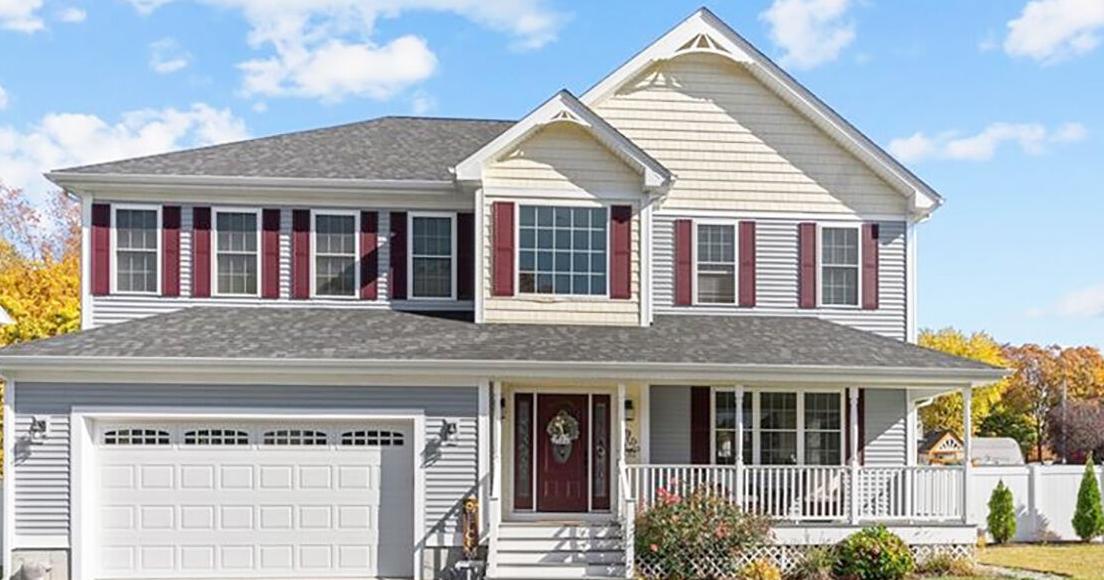 Woonsocket colonial features three levels of custom luxury, convenience