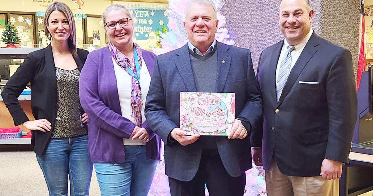 Tikoian donates friend's Christmas book to NP Library | Commerce ...