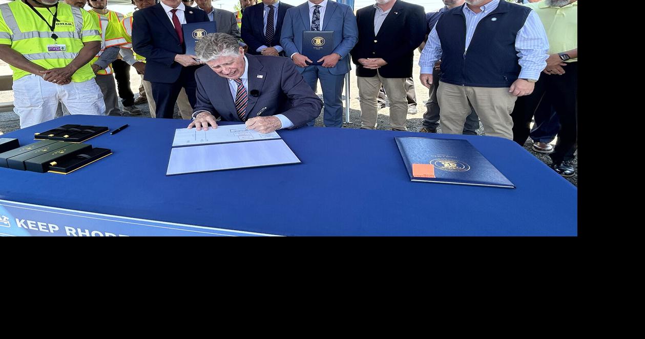 McKee holds signing ceremony for construction bills at Pawtucket High School worksite