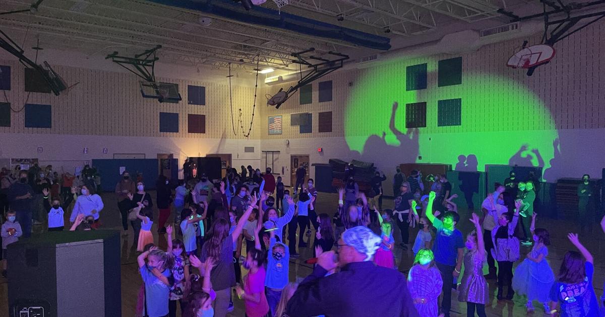 Photos Country View Elementary School holds ‘Glow Dance’ Schools