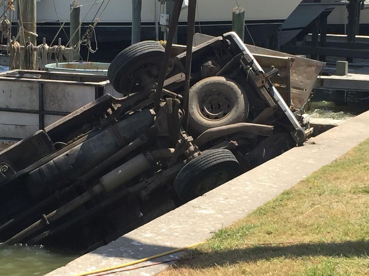 Truck overturns in Port O'Connor Fishing Center canal