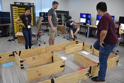 Students learn about programming robots during camp