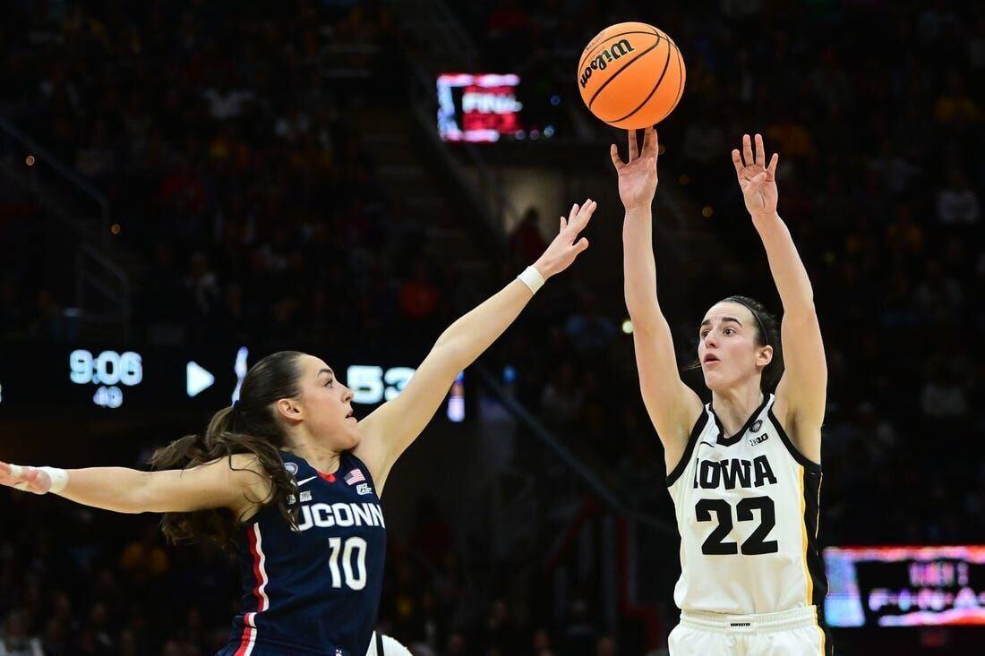 Iowa returns to NCAA final with tight win over UConn College