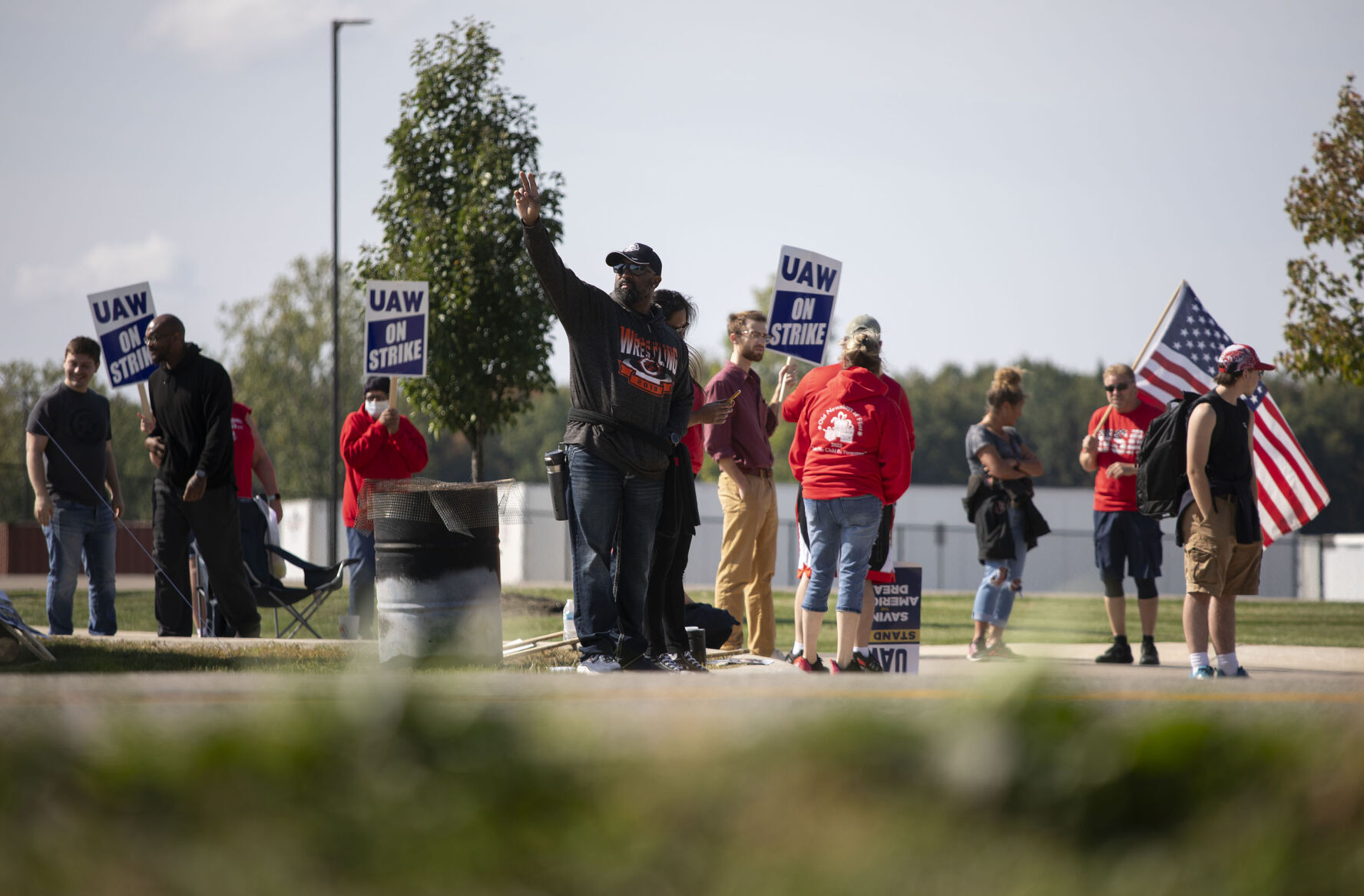 Trump battles Biden for union vote in strike embroiled Michigan