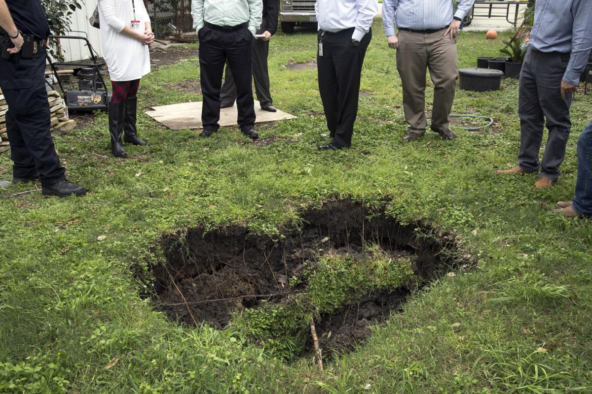 Watchdog Sinkhole Opens In Backyard Local News Victoriaadvocatecom