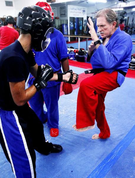 martial arts teacher approaching milestone tournament local martial arts teacher