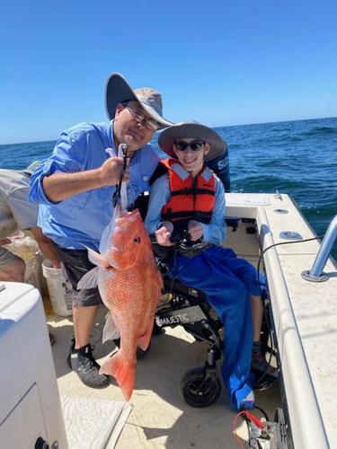 Victoria teen with cerebral palsy enjoys day of fishing after friend loans  them boat, News