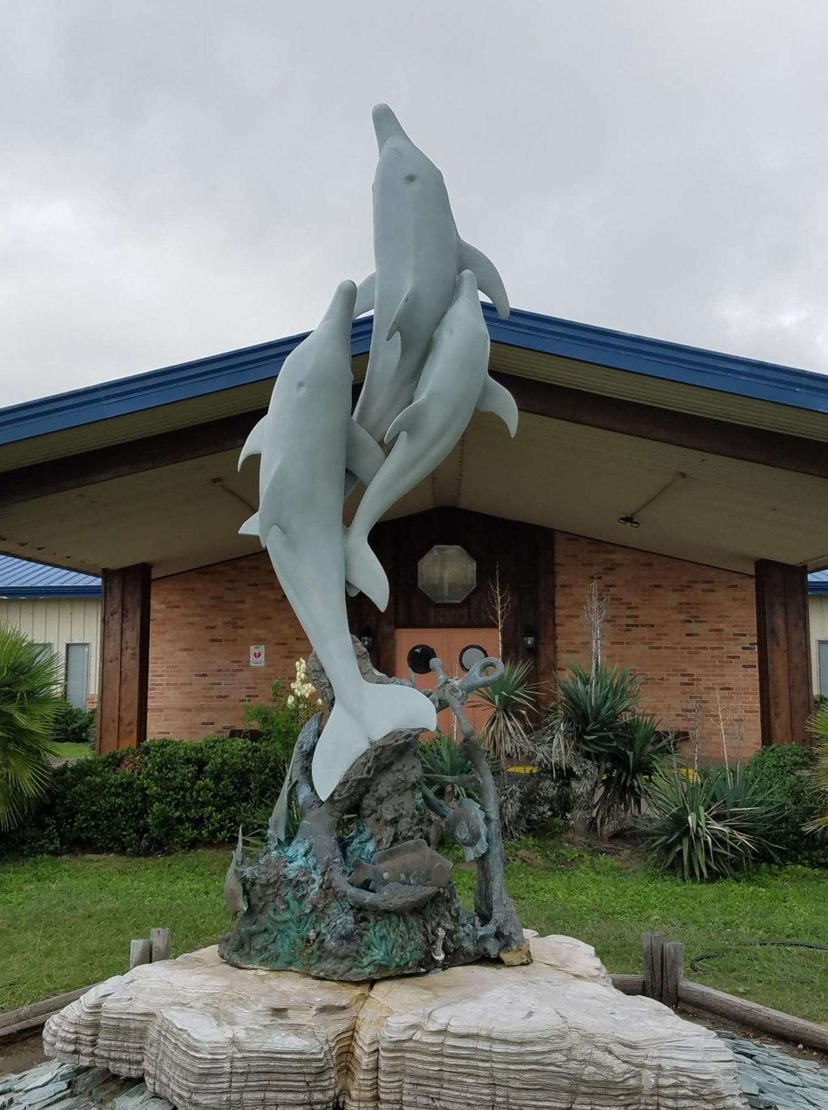 mermaid and dolphin statue