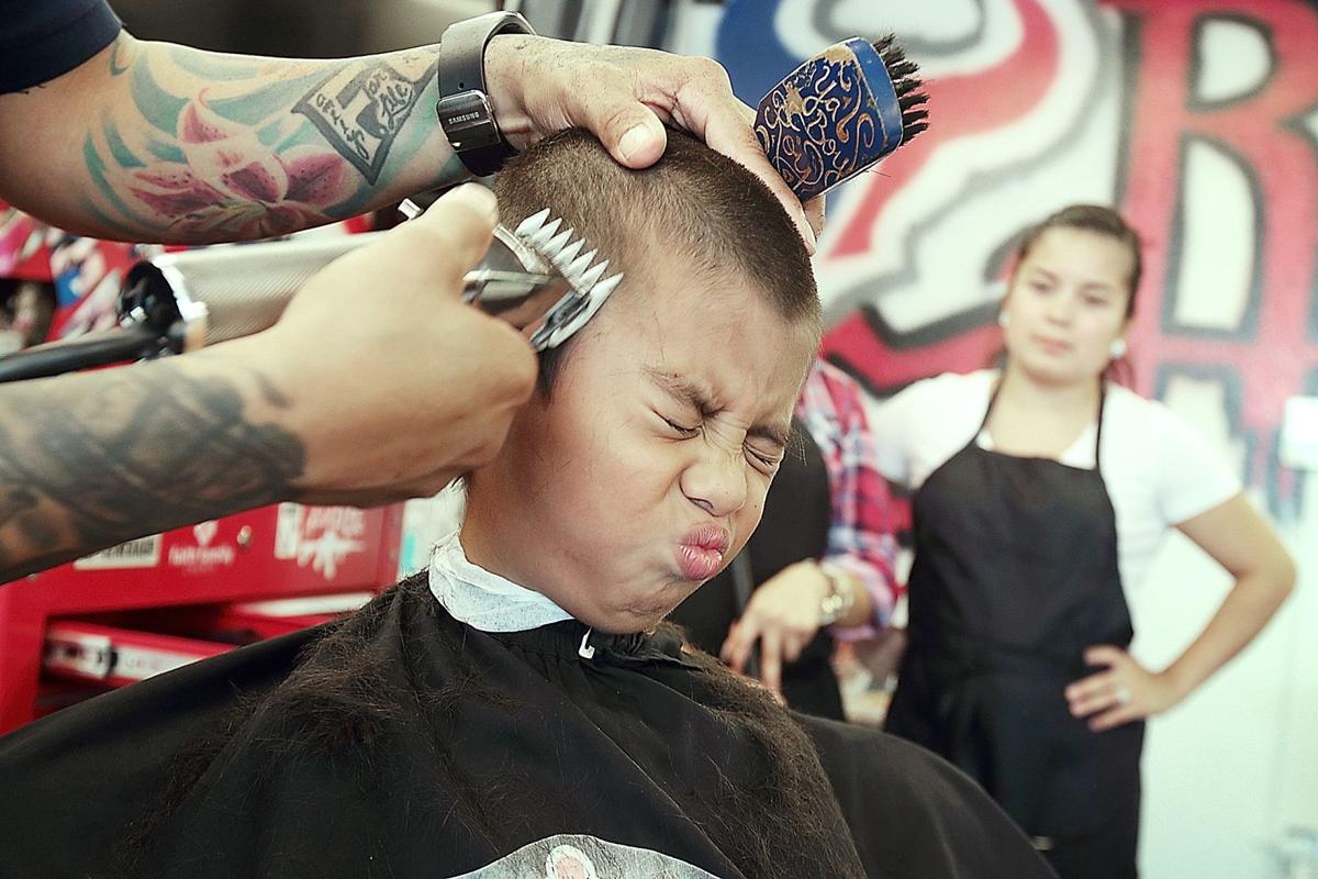 Barber Shop Provides Free Haircuts For Back To School