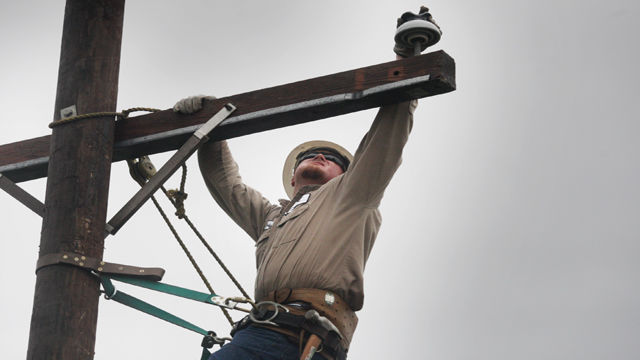 Linemen learn to climb poles for new job training (video), Business