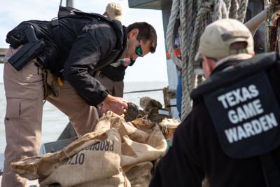 PHOTOS: Day in the life of a game warden, Local News