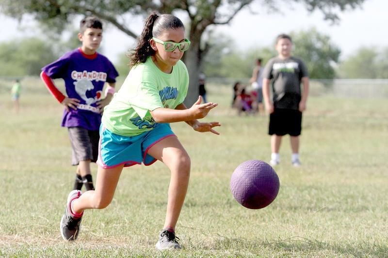 Kickball brings kids and parents from other schools together