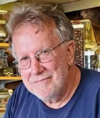 JAMES "MIKE" BURNETT